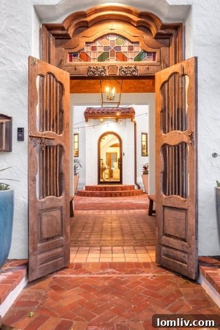 Renovated Bluffview Mediterranean exterior showcasing updated courtyard