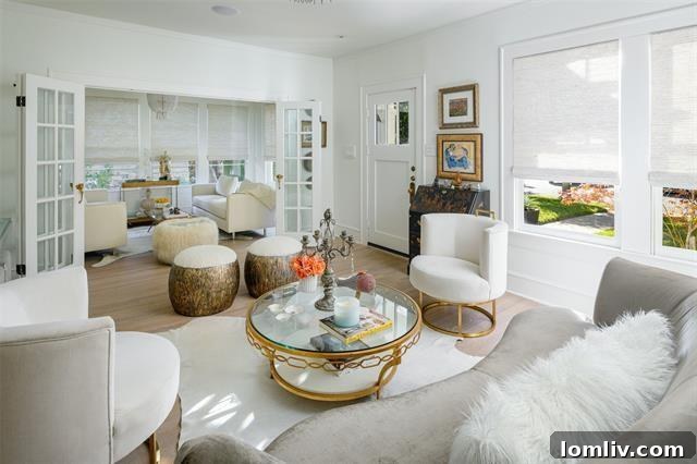 Inviting living room with original stained glass windows and a cozy working fireplace in the Craftsman home.