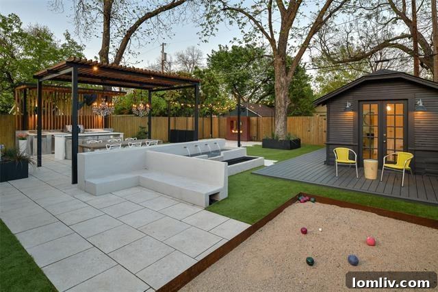 Bocce ball court and low-maintenance lawn in the spacious backyard, perfect for outdoor activities.