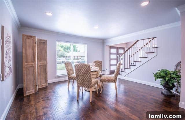 Elegant dining area adjacent to the kitchen, perfect for entertaining guests.