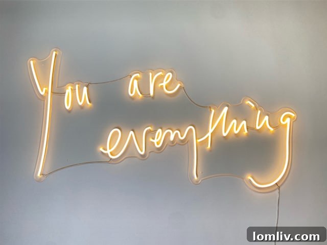 Goop's handwritten 'You Are Everything' neon sign