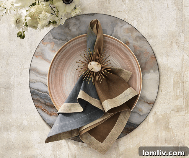 Kim Seybert's ombre dip-dye napkins and brass rings from Elements