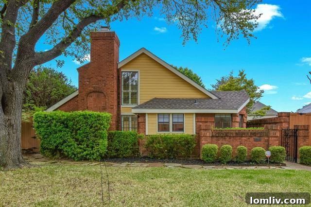 Bright, Bold, and Beautiful: This North Dallas Gem Features Soaring Ceilings, Abundant Light, and Distinctive Architecture 2 Charming North Dallas Home Exterior with Lush Landscaping