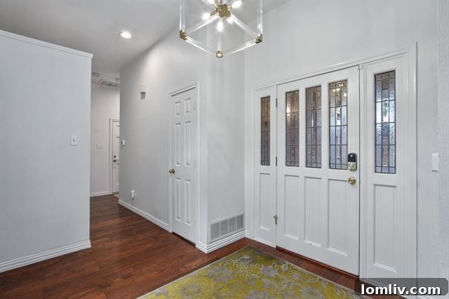 Bright, Bold, and Beautiful: This North Dallas Gem Features Soaring Ceilings, Abundant Light, and Distinctive Architecture 4 Cozy Outdoor Lounge Area with Television on Patio
