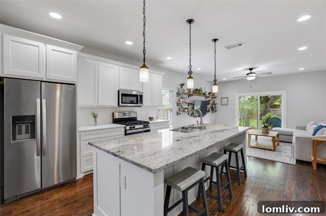Gourmet kitchen with gas range and custom cabinetry