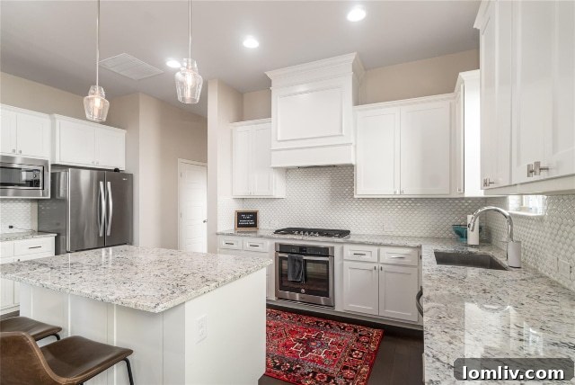 Abundant counter and cabinet space in the modern kitchen of this Linwood townhome, built by Village Homes in 2017.