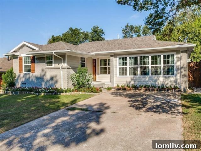 A charming single-story home with a manicured lawn, nestled amongst mature trees in the desirable White Rock Valley neighborhood.