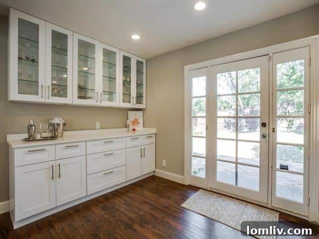 The elegant butler's pantry area, complete with additional storage and counter space, offering seamless service for entertaining guests.