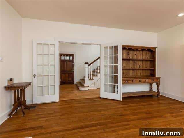 Living room with French doors and hardwood floors