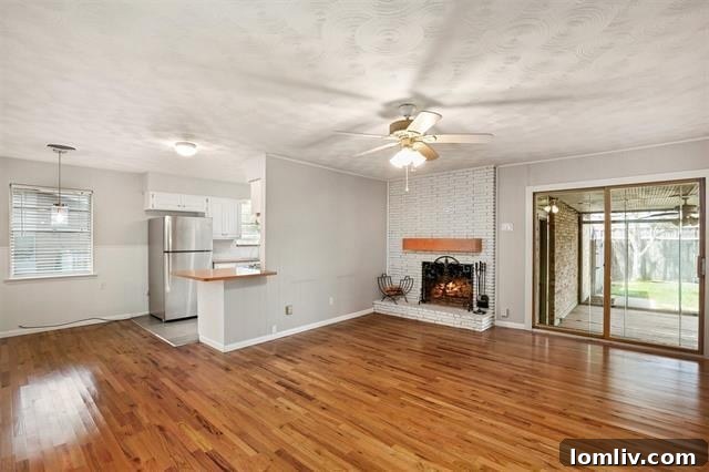 A charming interior shot of the Buckner Terrace home, highlighting its cozy living spaces and potential for personalization. Experience affordable Dallas living.