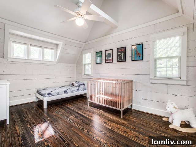 The elegant staircase of the historic 5526 Monticello Avenue home.