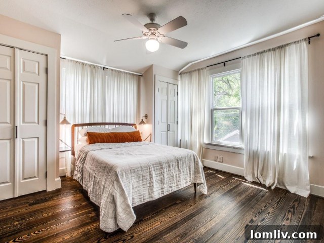 A bedroom featuring the charming vaulted ceiling and wood-planked details.