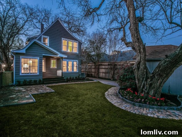 The exterior of the Greenland Hills Tudor at 5526 Monticello Ave, a blend of history and modern living.