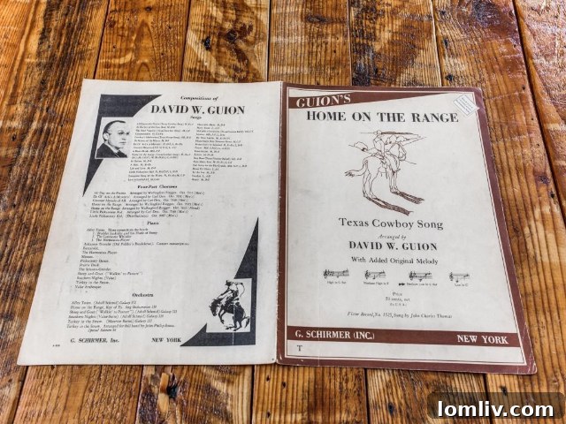 Vintage sheet music of 'Home on the Range,' a nod to David Guion's legacy, awaits the new homeowner of this Greenland Hills Tudor.