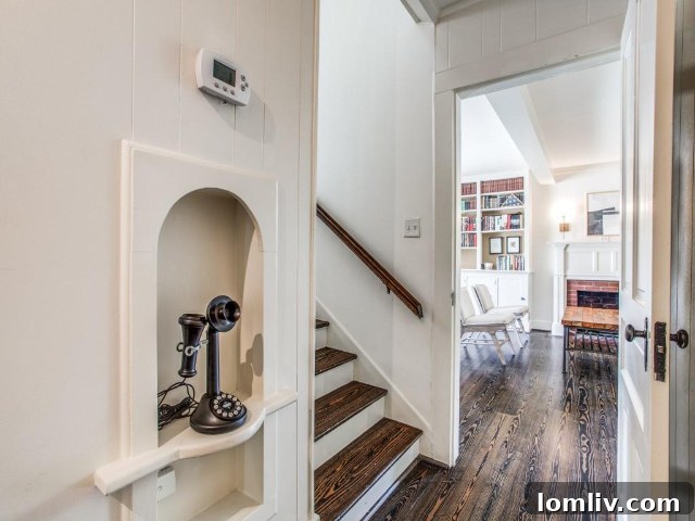The charming exterior of the renovated Greenland Hills Tudor, preserving its 1920s appeal.
