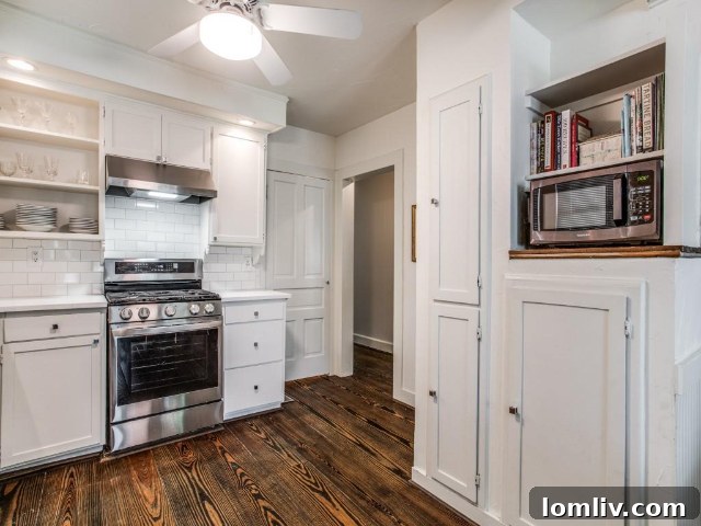 Modern comforts blend with historic charm in this Dallas Tudor.