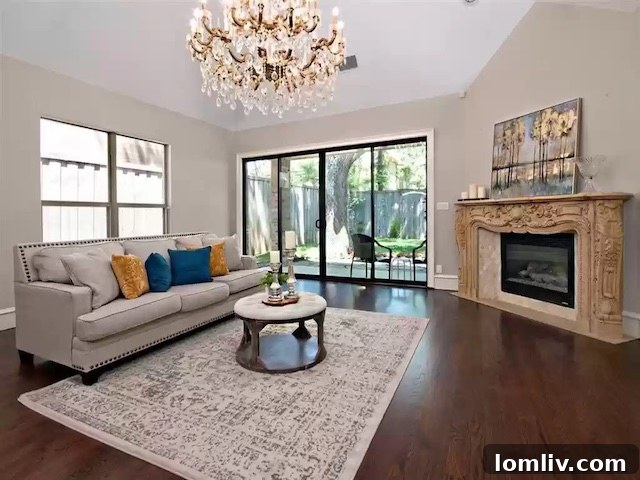 Spacious Living Room with Fireplace and Patio Access