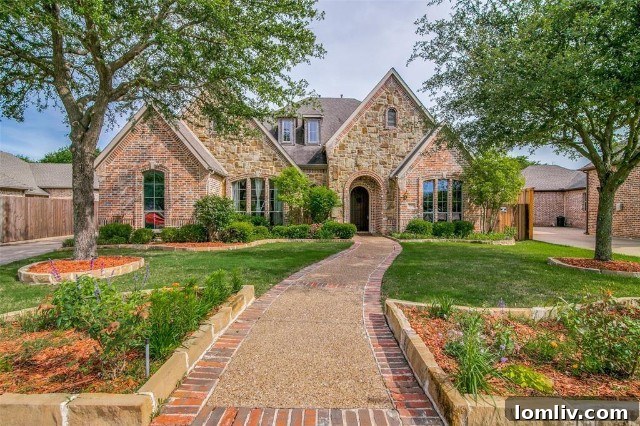 Aerial view of 2365 Lake Forest Drive, Rockwall, highlighting its spacious lot and prime location near Lake Ray Hubbard