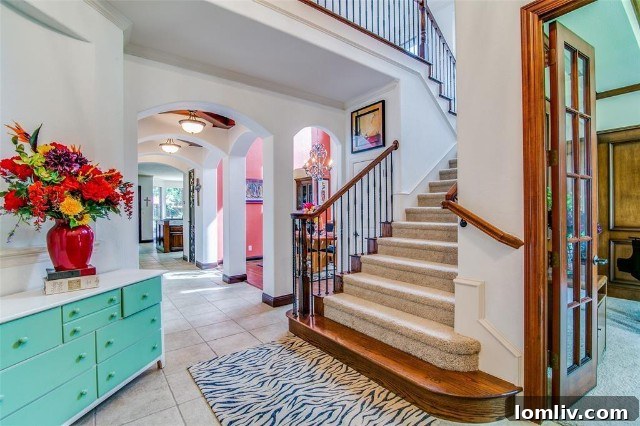 Current interior view of the same room at 2365 Lake Forest Drive, now infused with vibrant colors and personalized decor