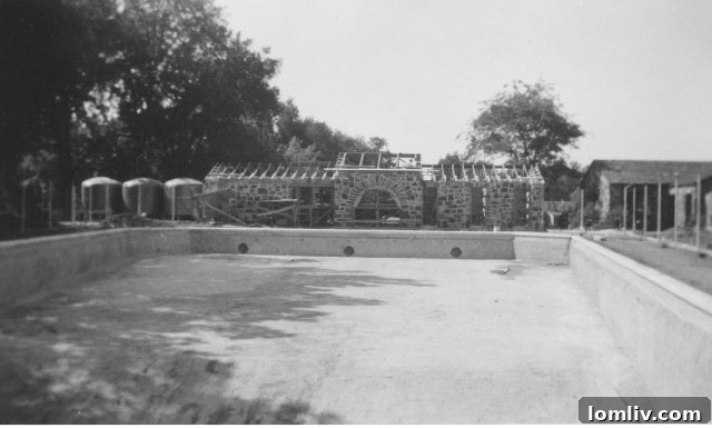 Historical archive photo depicting the Tietze Bathhouse under construction in August 1946, providing insight into its development.