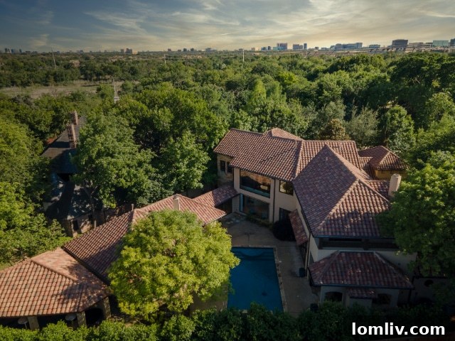 Mediterranean Revival Estate Exterior with Poolside View