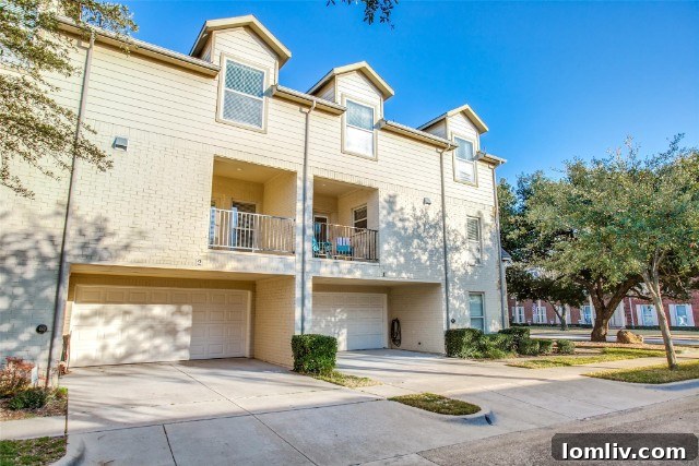 Updated kitchen with white cabinets and granite countertops at 4524 Emerson Avenue #2