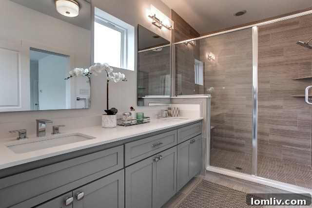 Modern farmhouse style bathroom with large shower and quartz countertops at The Bluffs