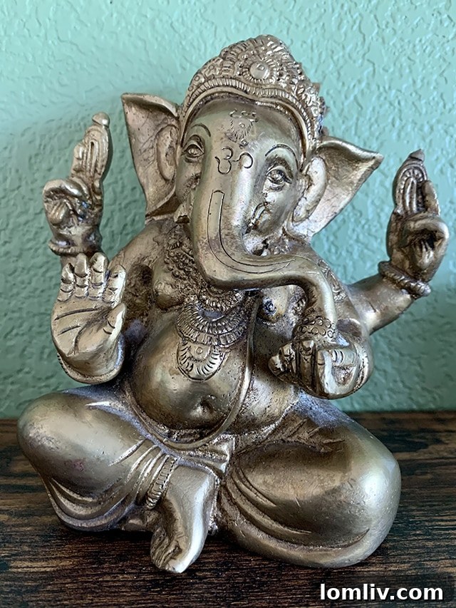 Symbolic Ganesha statue, easily recognized by its elephant head, representing wisdom, understanding, and remover of obstacles