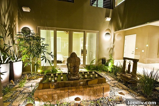 Luxurious spa-like patio transformed into an outdoor sanctuary, featuring comfortable seating and natural elements for ultimate relaxation