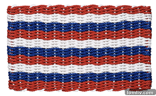 Reversible woven red, white, and blue striped rope doormat, made in the USA