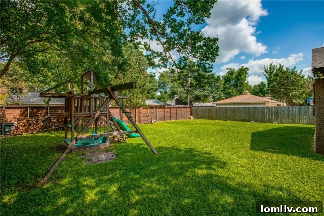 Expansive Outdoor Space and Playhouse in Backyard