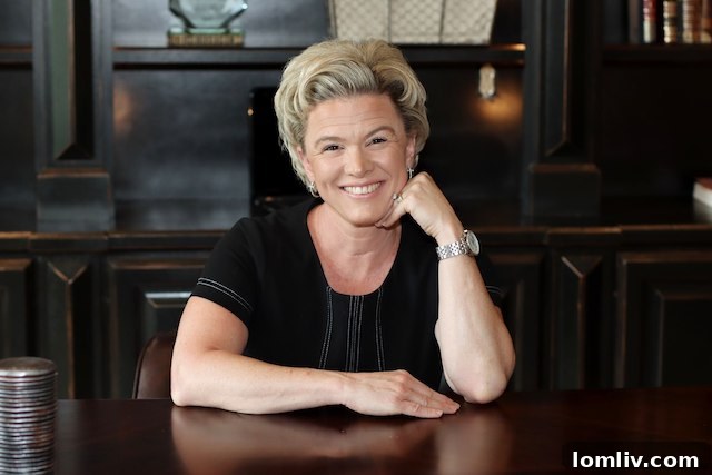 Shannon Wiser, a dedicated real estate professional and philanthropist, smiling.