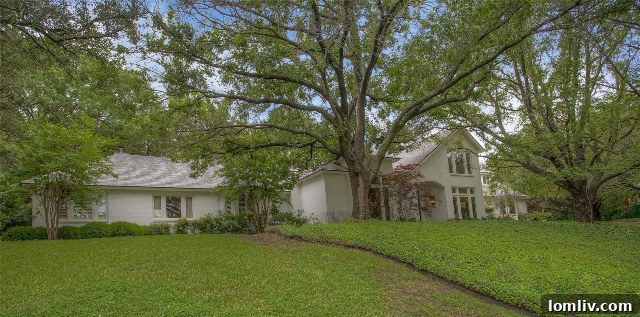 Mature shade trees providing natural cooling for a Fort Worth luxury property