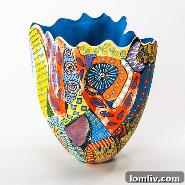 Jean Elton hand-painted ceramic 'Tall Vase' reflecting light, inspired by fireworks
