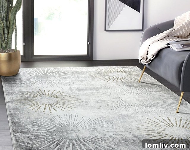 Abani Luna grey and gold fireworks area rug with distressed edges for depth