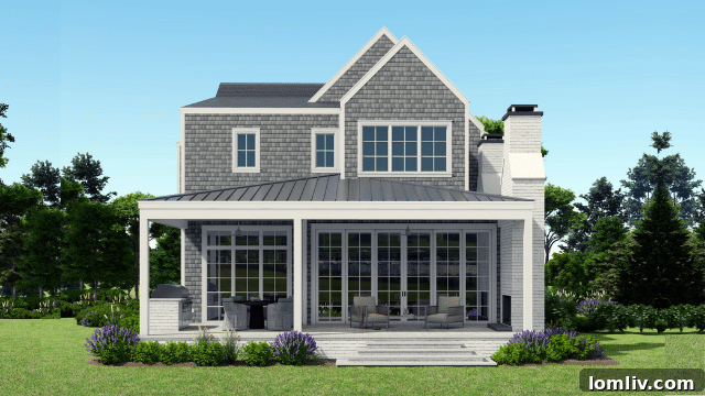 Elegant Cape Cottage 'Seabury' exterior with lake views and lush landscaping at Long Cove