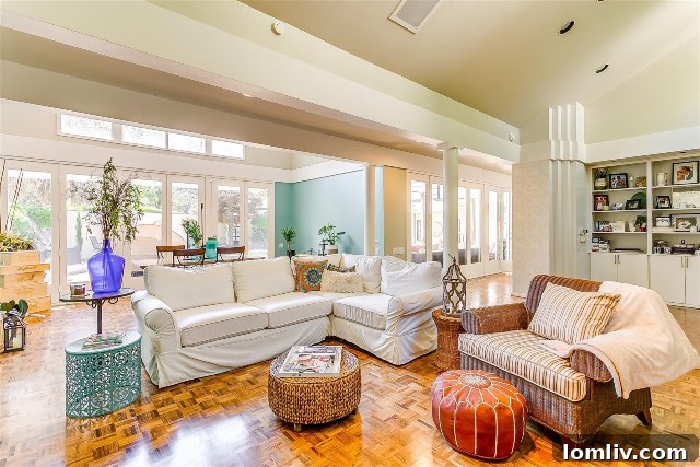 Spacious Living Area with Scenic Views and Parquet Flooring