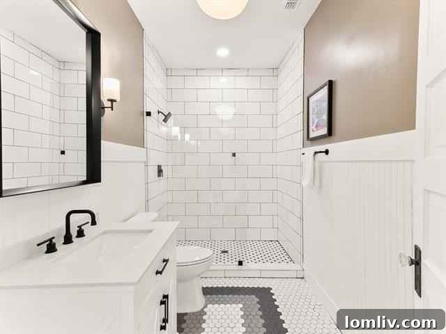 Elegant Bathroom Vanity with Modern Fixtures and Gray Cabinets
