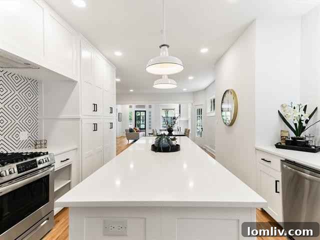 Elegant Kitchen Island with Seating and Modern Lighting