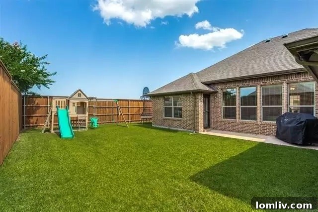 Well-maintained backyard with patio