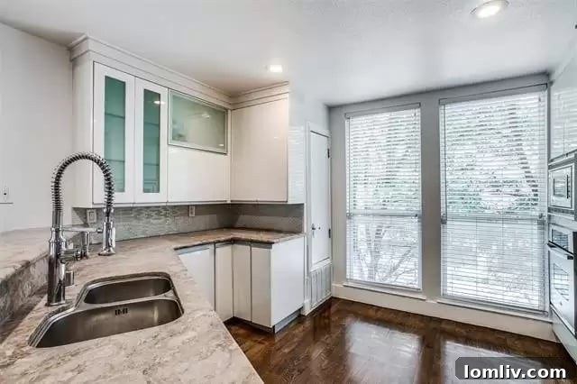 Spacious primary bedroom with balcony access