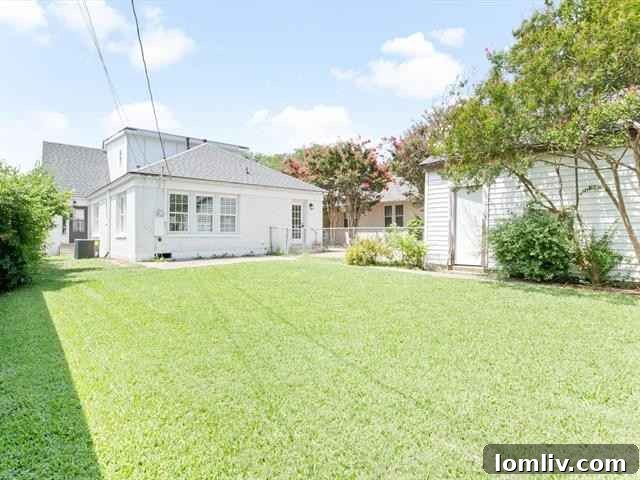 Detached Garage and Potential-Filled Backyard of a Fort Worth Home
