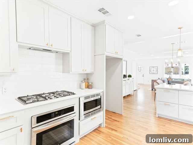 Gourmet Kitchen with Stainless Appliances and Brass Hardware in North Hi Mount