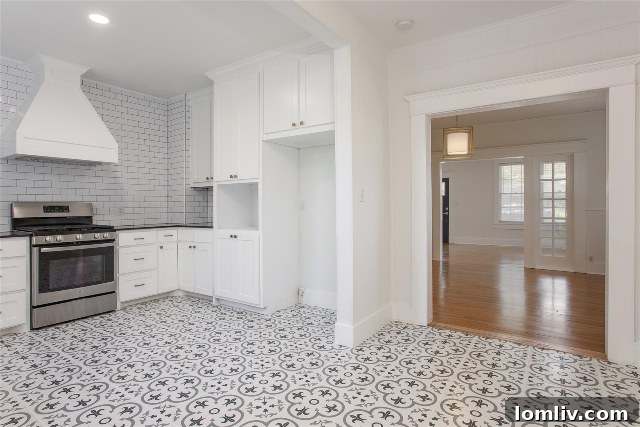 Exceptional Value Awaits in Arlington Heights 2-Bedroom Homes 5 Enlarged kitchen doorway at 1809 Virginia Place for a more spacious feel.