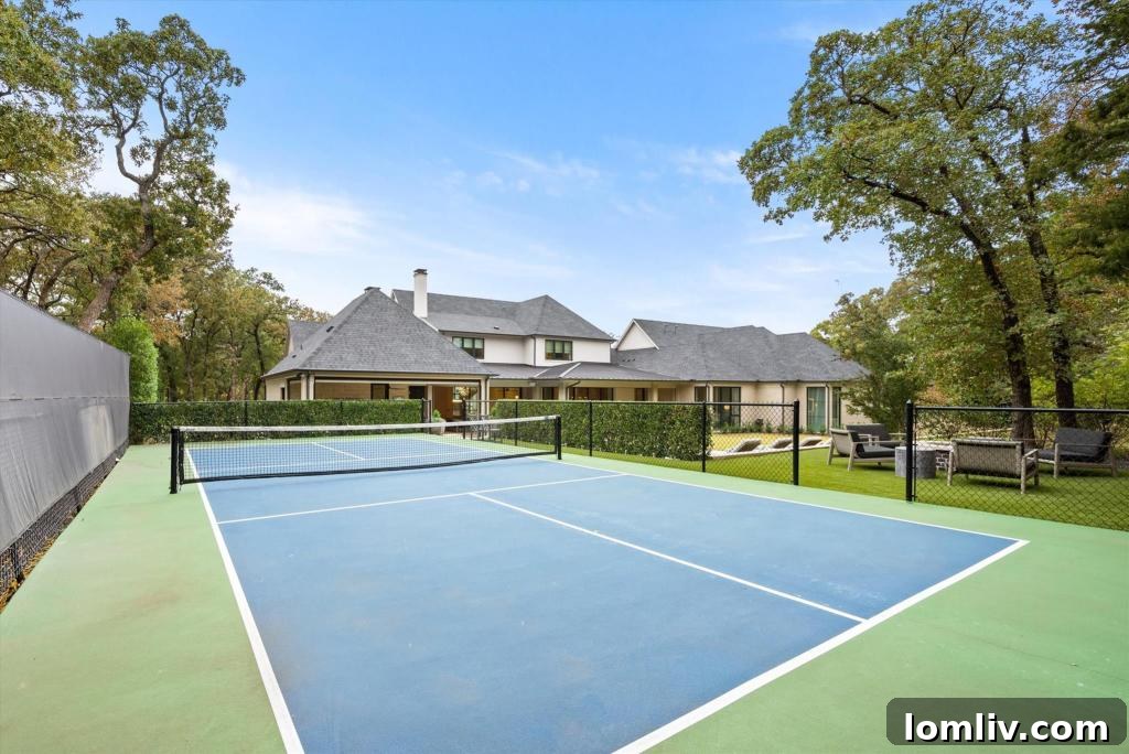 Beautifully landscaped backyard with a large swimming pool and a luxurious spa