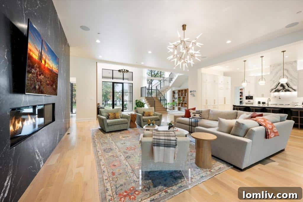 View of the elegant lounge area with a fireplace and stylish furnishings