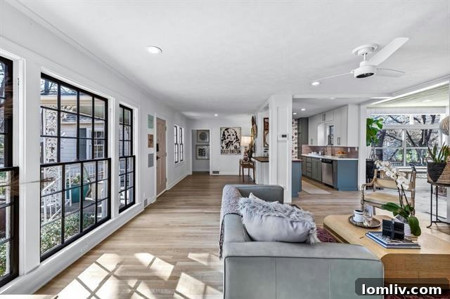 Interior of Oakhurst bungalow featuring pristine natural oak floors and expansive windows