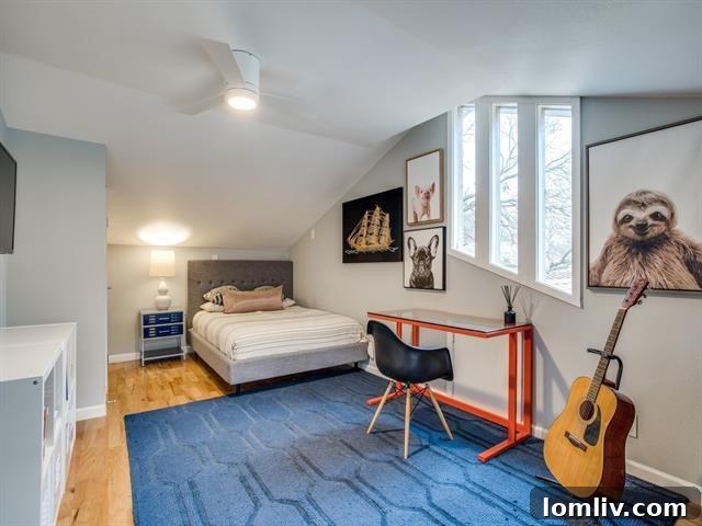 One of the comfortable bedrooms with designer wallpaper and ample light