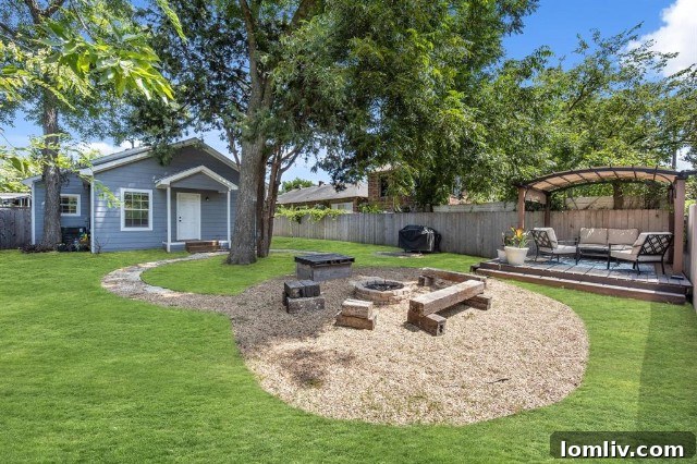 Spacious backyard with fire pit and shaded pergola deck at 1731 Seevers Avenue, Dallas