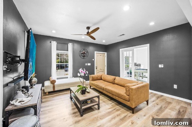 Inviting living room with white oak engineered floors in 1731 Seevers Avenue